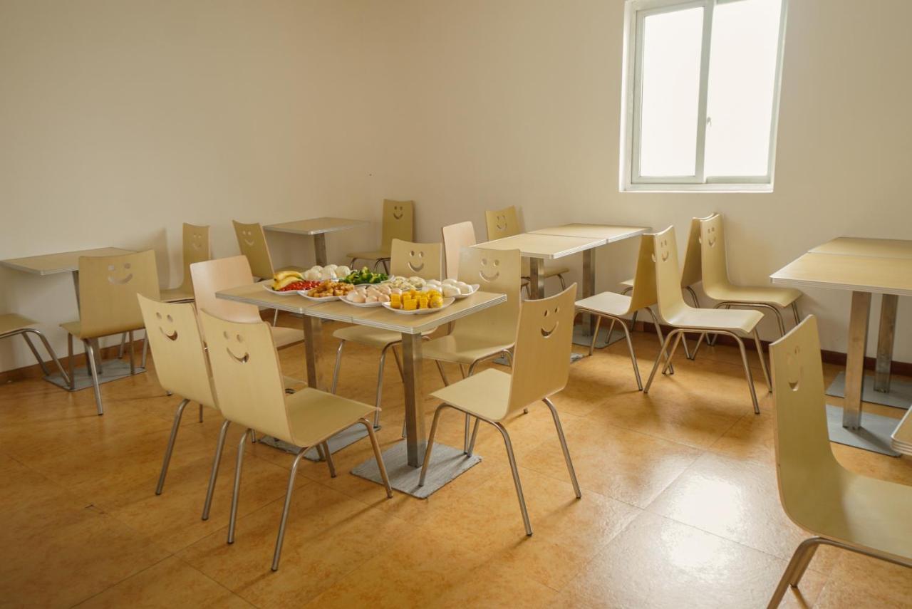 גואנגג'ואו Jia Mei Xin Holiday Hotel Baiyun Airport Branch מראה חיצוני תמונה