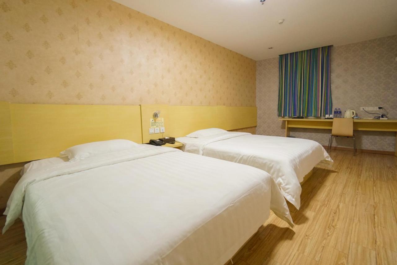 גואנגג'ואו Jia Mei Xin Holiday Hotel Baiyun Airport Branch מראה חיצוני תמונה