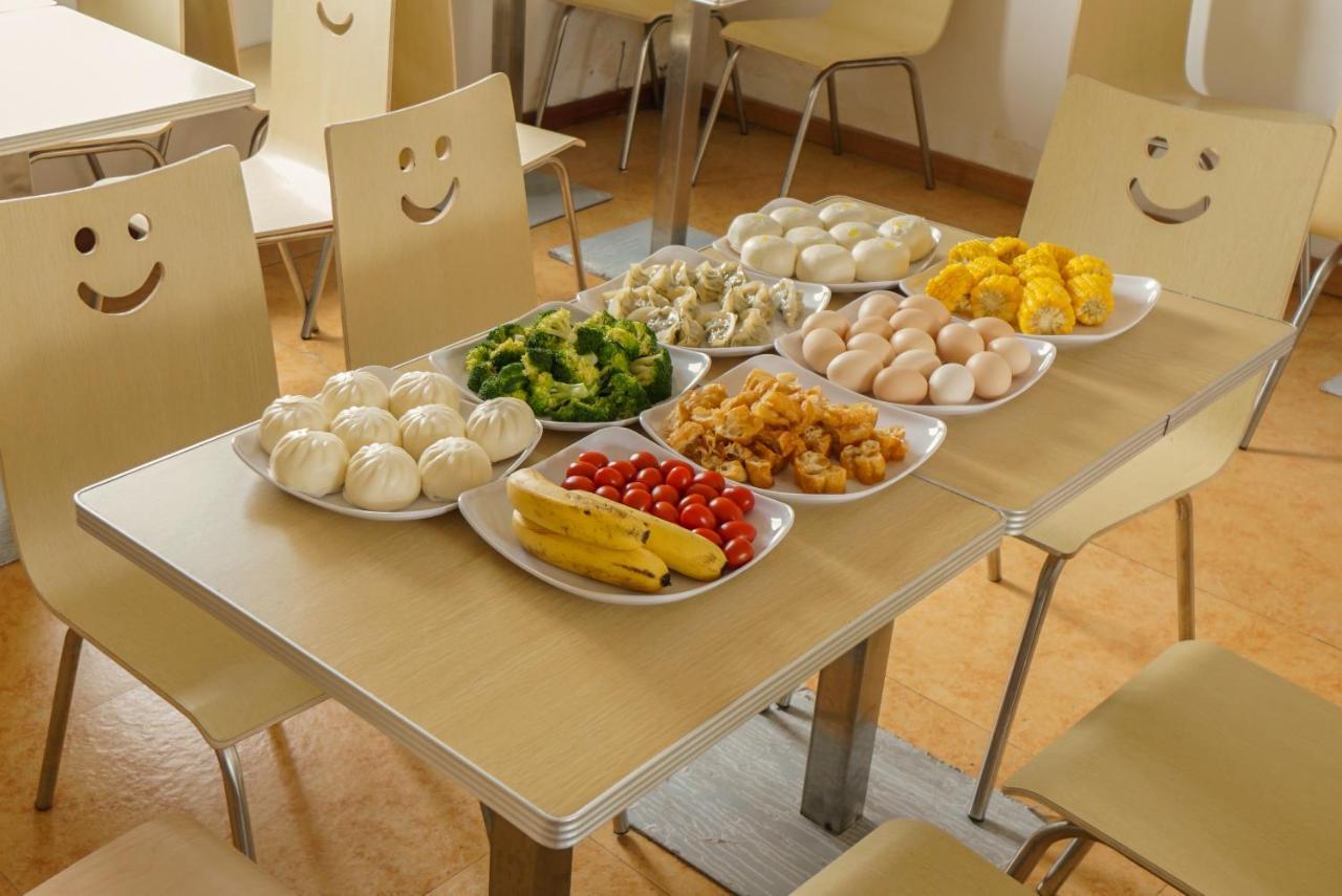 גואנגג'ואו Jia Mei Xin Holiday Hotel Baiyun Airport Branch מראה חיצוני תמונה